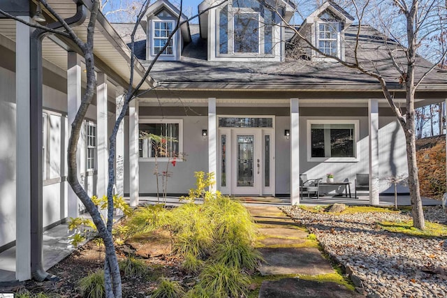 doorway to property with covered porch