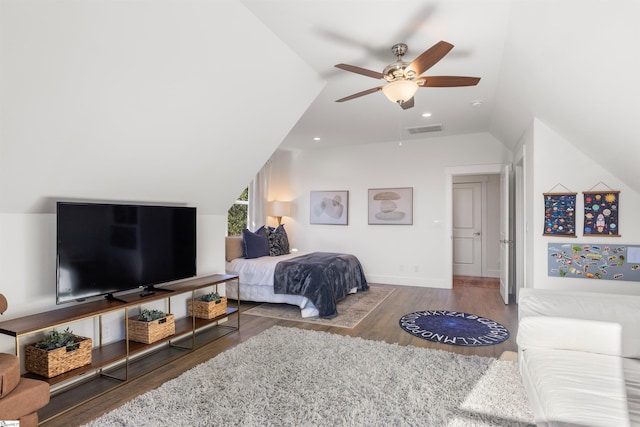 bedroom with hardwood / wood-style floors, ceiling fan, and lofted ceiling