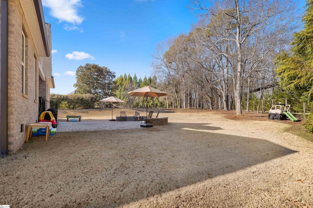 view of yard with a playground