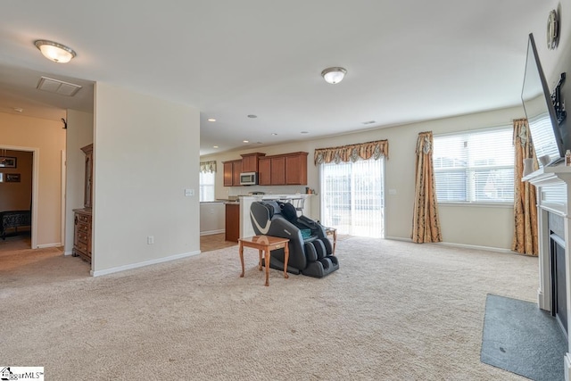 living room featuring light colored carpet