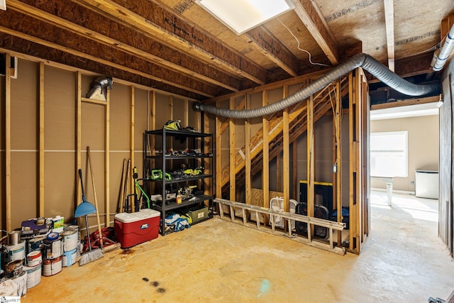 basement featuring refrigerator