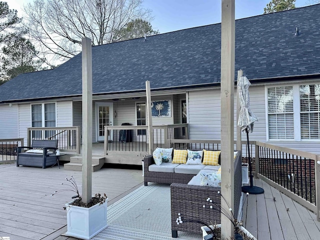 wooden deck featuring outdoor lounge area