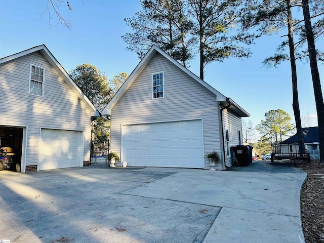 view of side of property featuring a garage