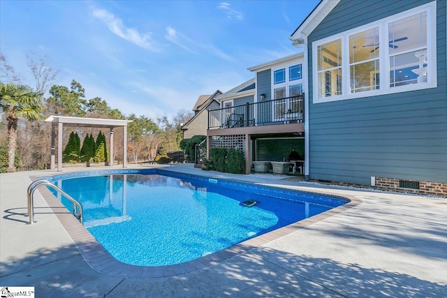 view of pool with a patio