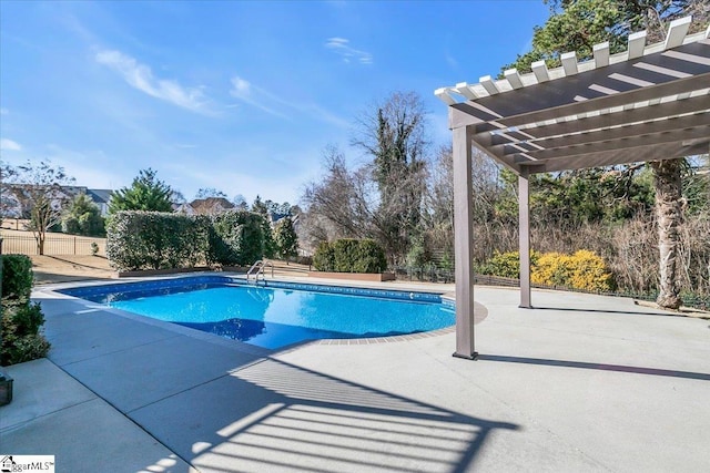 view of pool featuring a patio area and a pergola