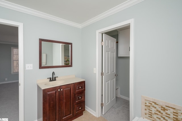 bathroom featuring vanity and crown molding