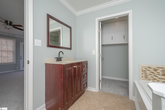 bathroom featuring ornamental molding, vanity, ceiling fan, a bath, and tile patterned flooring