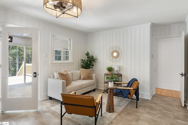 sitting room with a textured ceiling