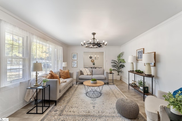 living room featuring ornamental molding and a chandelier