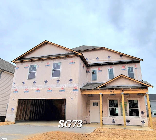 property in mid-construction featuring a garage