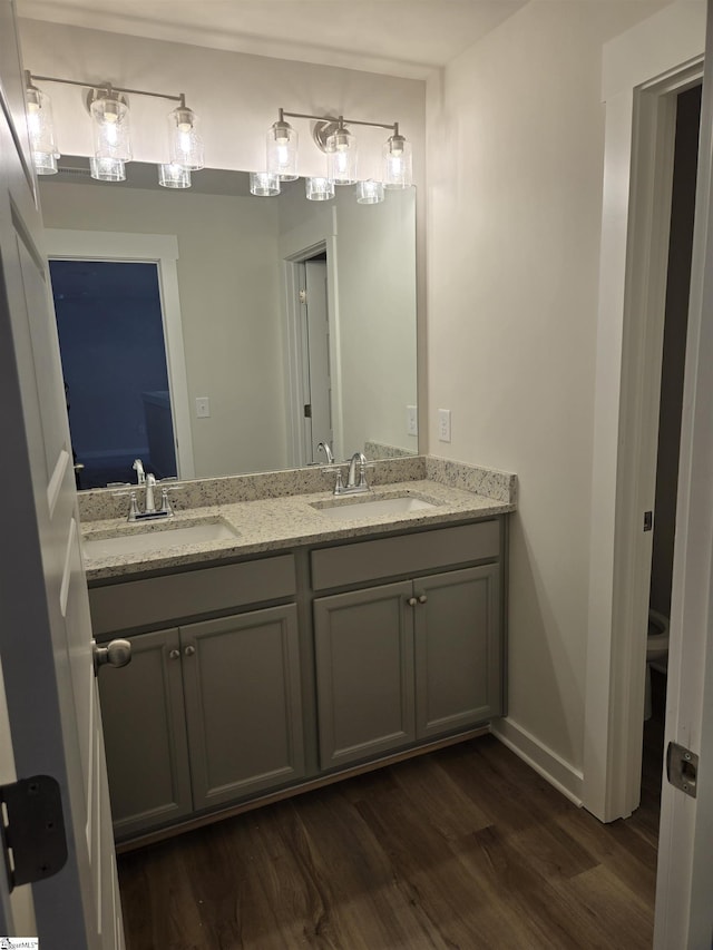 335 Alyssa Landing Dr Unit 73, Fountain Inn, SC 29644 - bathroom with wood finished floors, double vanity, and baseboards