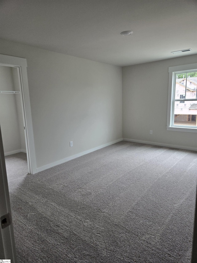 335 Alyssa Landing Dr Unit 73, Fountain Inn, SC 29644 - empty room featuring carpet floors and baseboards