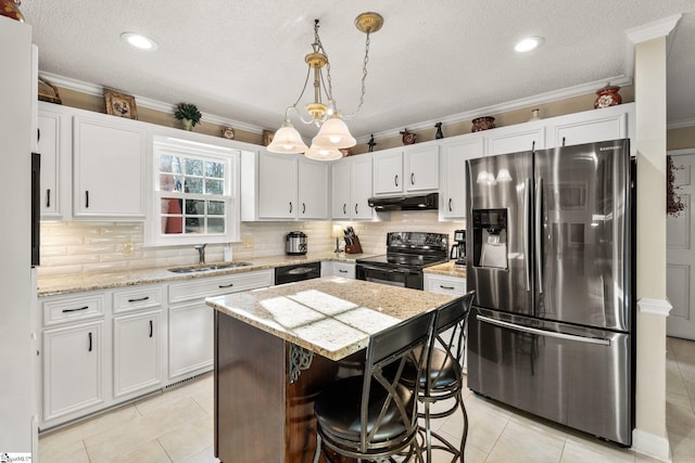 kitchen featuring sink, a center island, white cabinetry, and black appliances