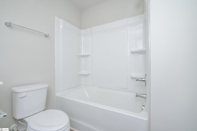 bathroom featuring toilet and shower / washtub combination