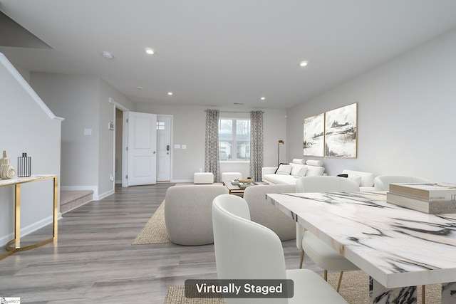 living room featuring light wood-type flooring