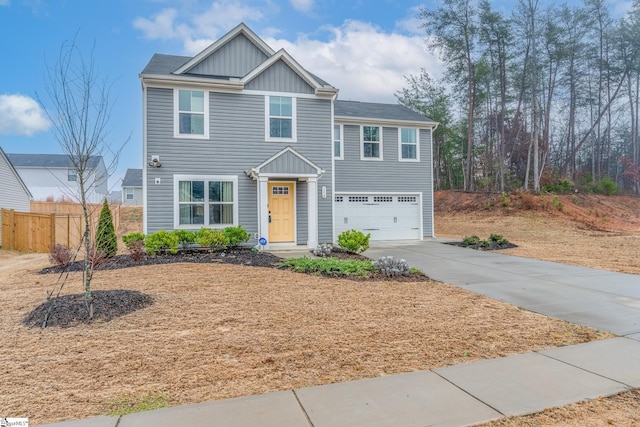 view of front of home with a garage