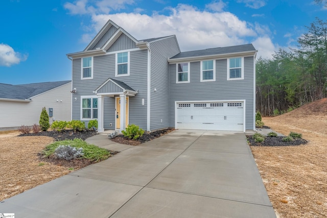 view of front of home with a garage