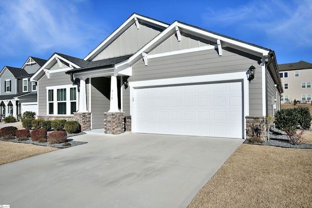 craftsman house with a garage