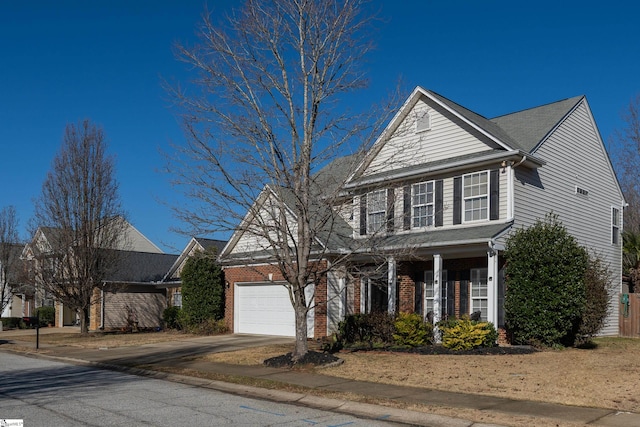 view of front of property featuring a garage