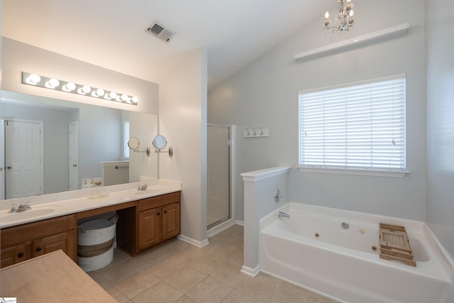 bathroom featuring tile patterned flooring, vanity, separate shower and tub, and vaulted ceiling