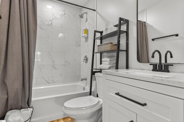 full bathroom featuring toilet, vanity, and shower / tub combo with curtain