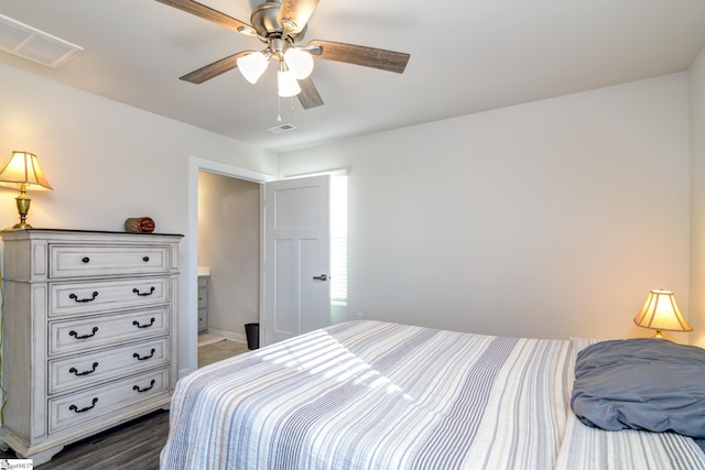 bedroom featuring ceiling fan and dark hardwood / wood-style floors