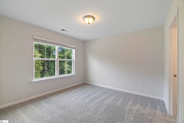 unfurnished room with carpet