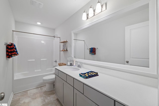 full bathroom with shower / tub combination, vanity, and toilet