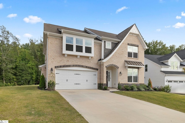 view of front of home featuring a garage and a front lawn