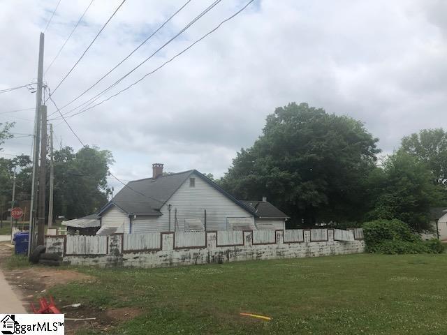 view of home's exterior with a yard