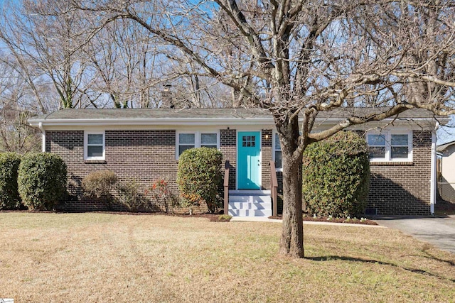 bungalow with a front yard