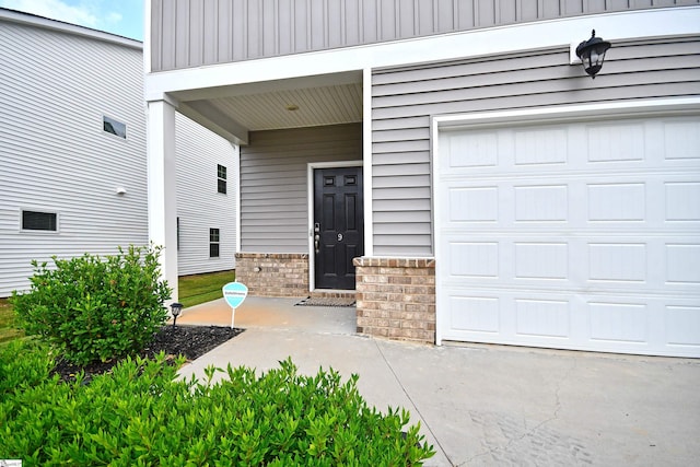 entrance to property featuring a garage