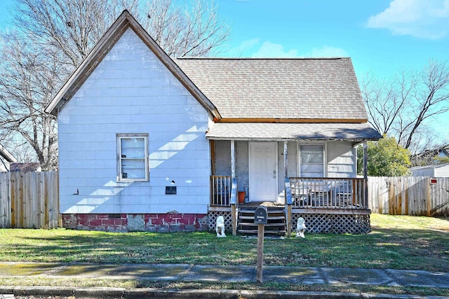 bungalow-style house featuring a front yard and a porch