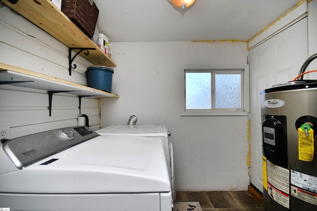 clothes washing area with independent washer and dryer and electric water heater