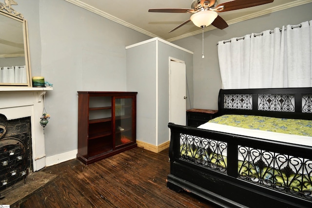 bedroom featuring ceiling fan, dark hardwood / wood-style floors, and ornamental molding