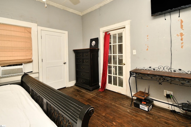 bedroom with cooling unit, crown molding, and dark wood-type flooring