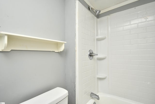 bathroom featuring toilet and tub / shower combination