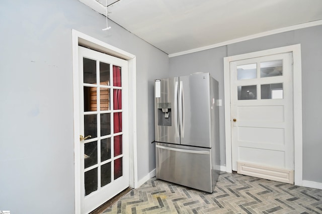 entryway with crown molding