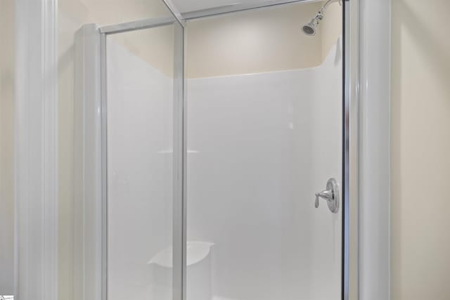 bathroom featuring an enclosed shower