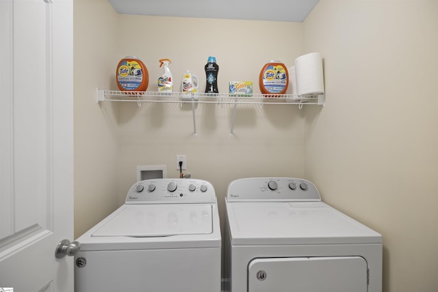 laundry area with washer and dryer