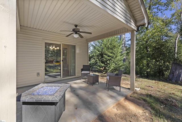 view of patio featuring ceiling fan