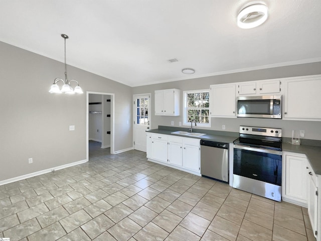 kitchen with white cabinetry, sink, stainless steel appliances, a notable chandelier, and pendant lighting