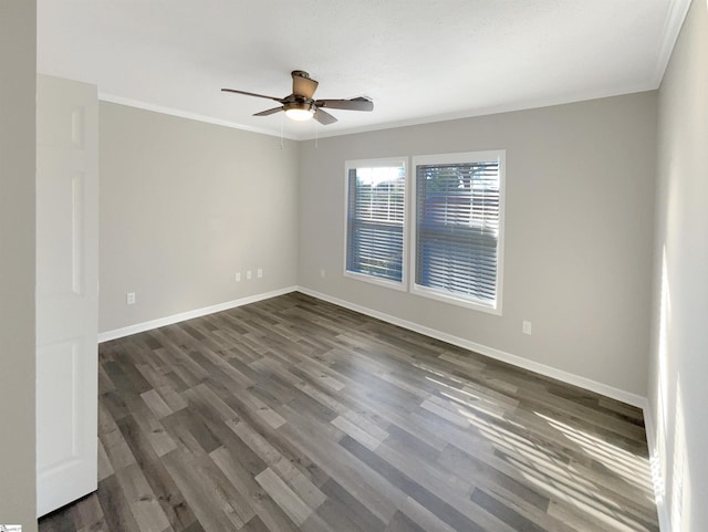 unfurnished room with ceiling fan, dark hardwood / wood-style flooring, and ornamental molding