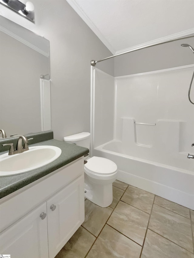 full bathroom with tile patterned floors, crown molding, toilet, vanity, and bathtub / shower combination