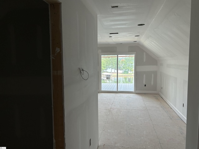 bonus room featuring vaulted ceiling