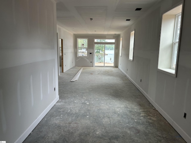 spare room with concrete floors