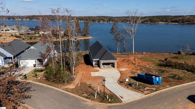 drone / aerial view with a water view