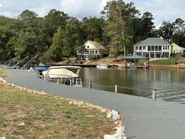 dock area with a water view