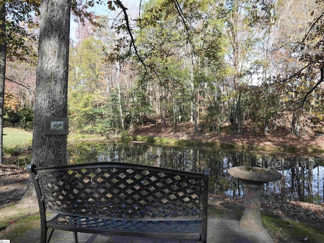 view of gate featuring a water view