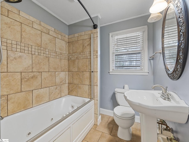 bathroom featuring tile patterned floors, ornamental molding, tiled shower / bath combo, and toilet